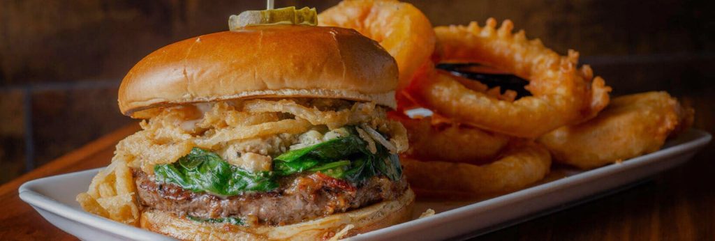 An up-close image of burger and fries served at BRU Burger Bar in Ohio.