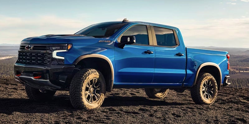 A blue 2024 Chevy Silverado 1500.